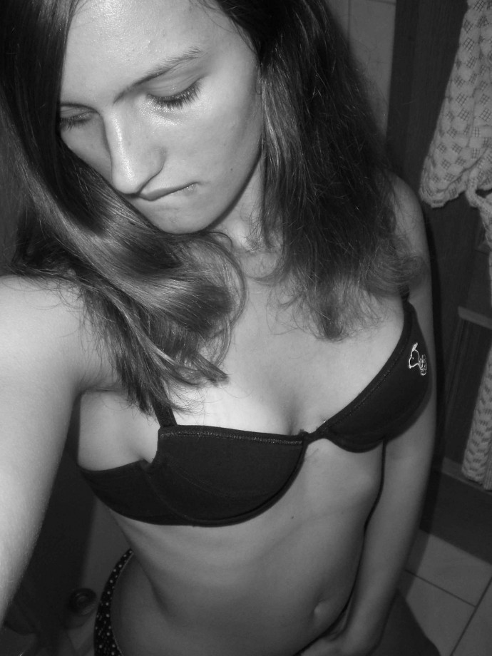 Slim girl in bathroom