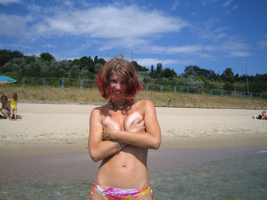 Topless on snowboard