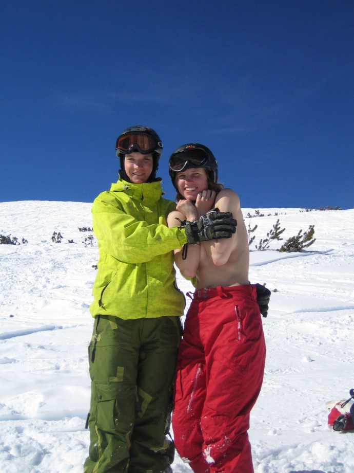 Topless on snowboard
