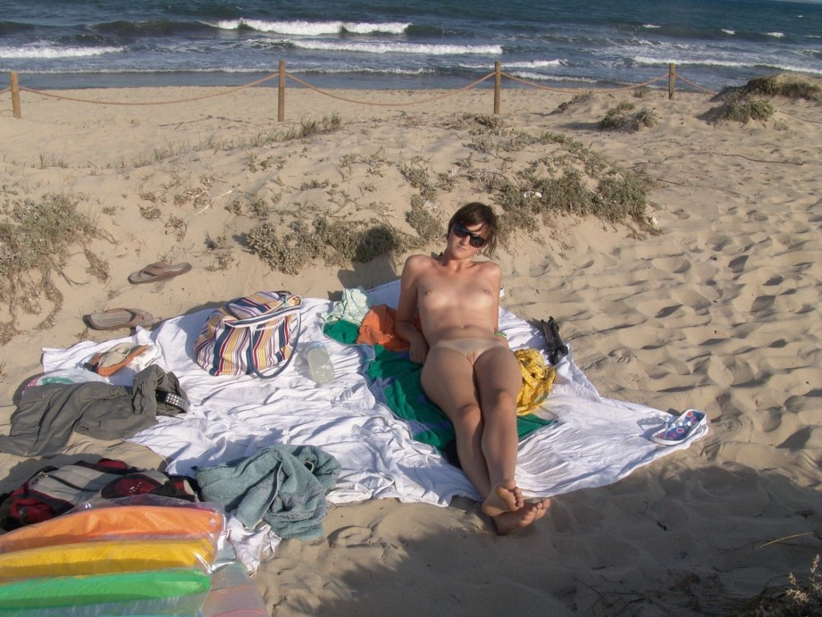 Nudist beach - slim girl