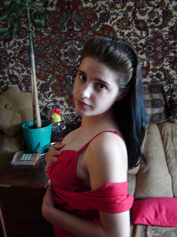 Pretty russian brunette posing at home