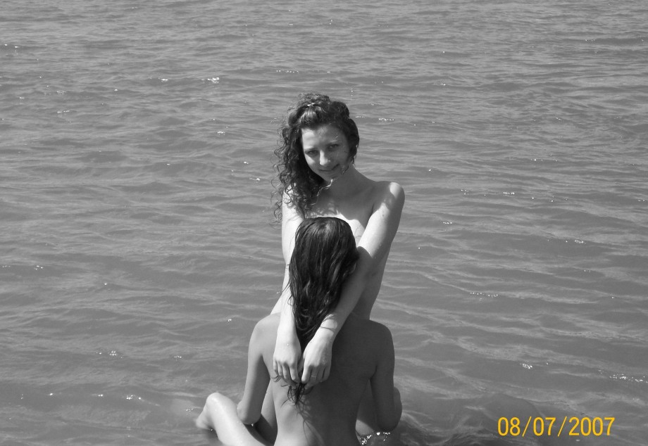 Curly nudist teen at lake