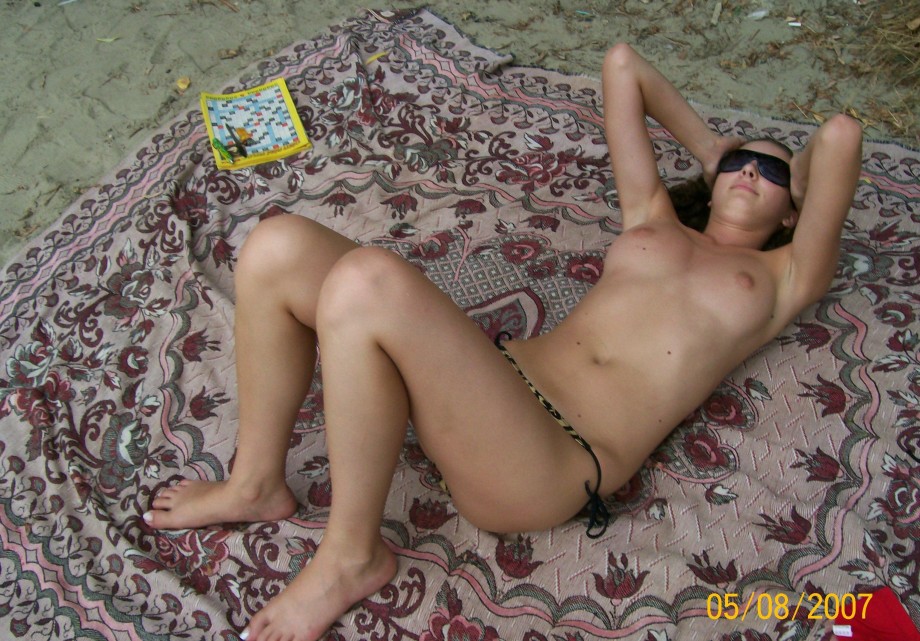 Curly nudist teen at lake