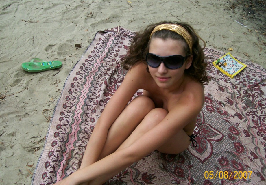 Curly nudist teen at lake