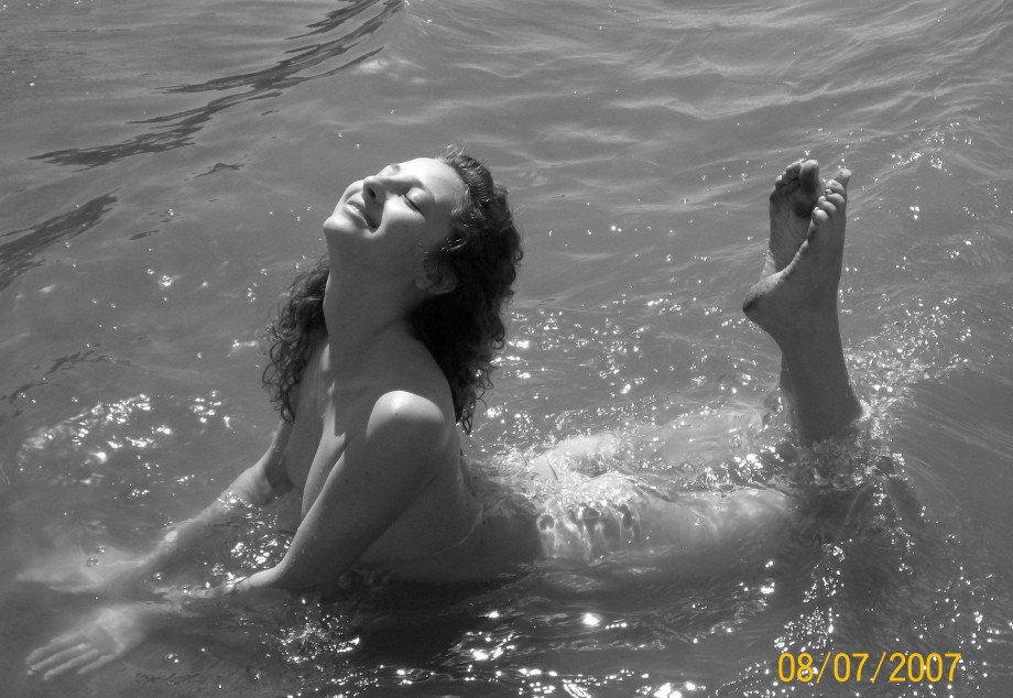 Curly nudist teen at lake