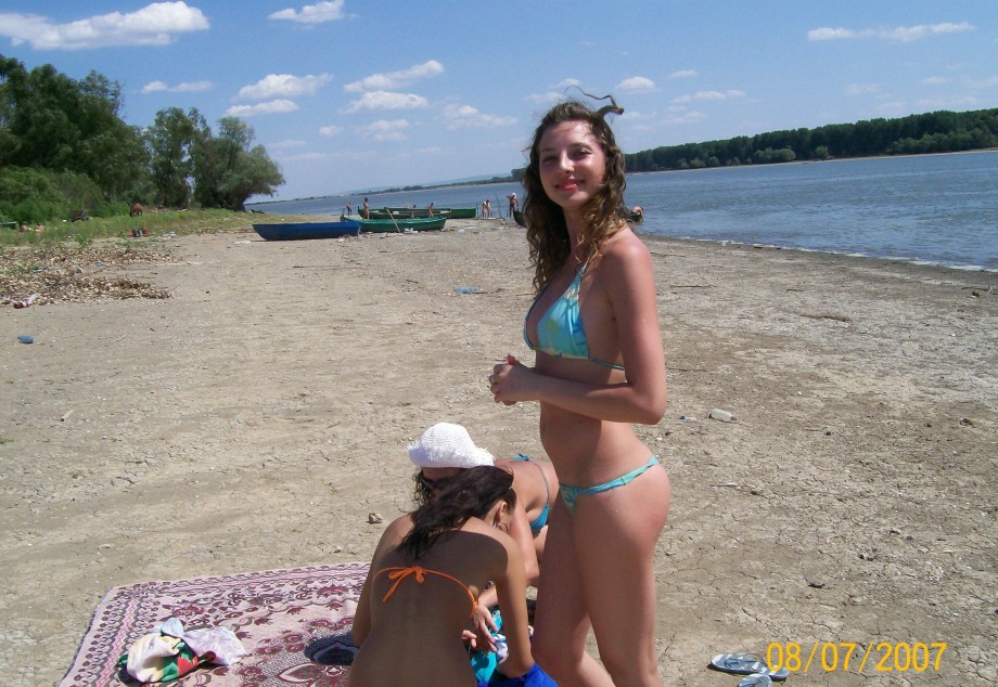 Curly nudist teen at lake