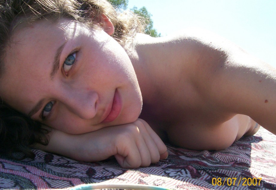 Curly nudist teen at lake