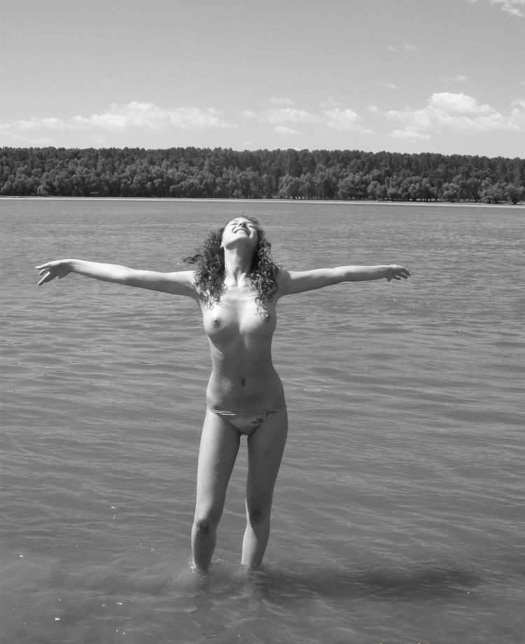 Curly nudist teen at lake