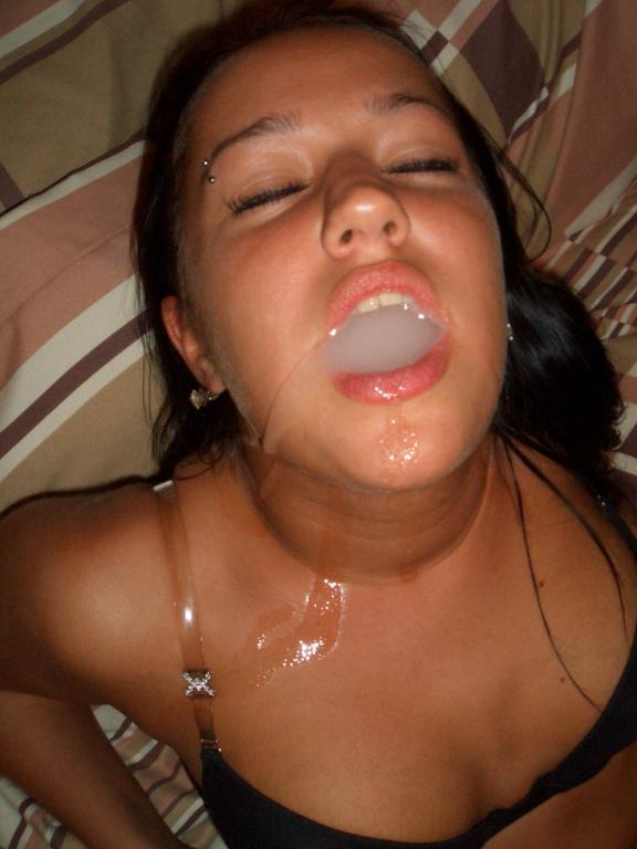 Brunette with a mouth full of sperm