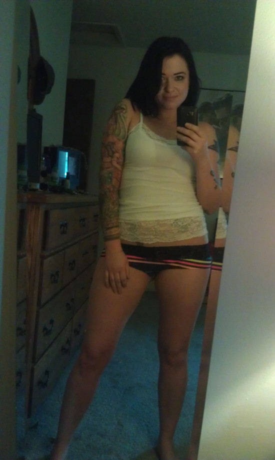 Tattooed gf posing