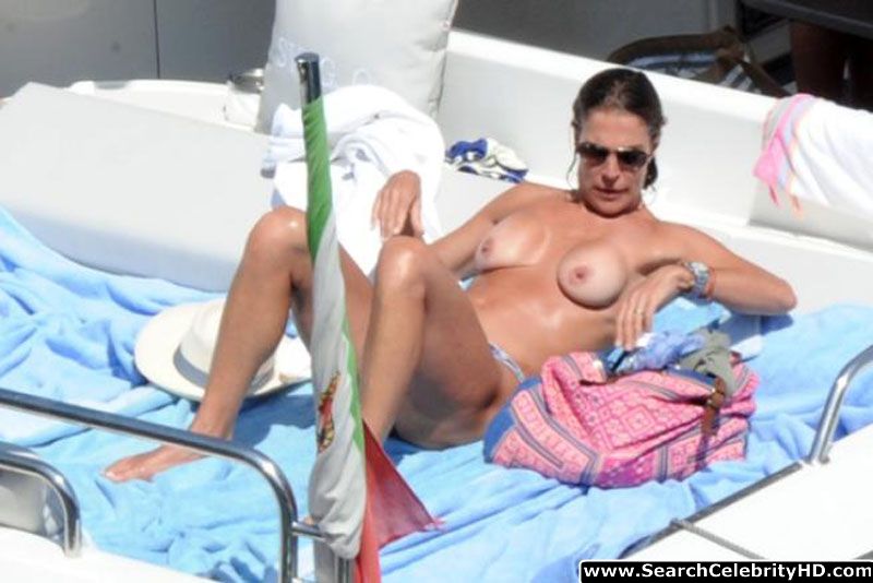 Fiona swarovski candid topless sunbathing bikini photos