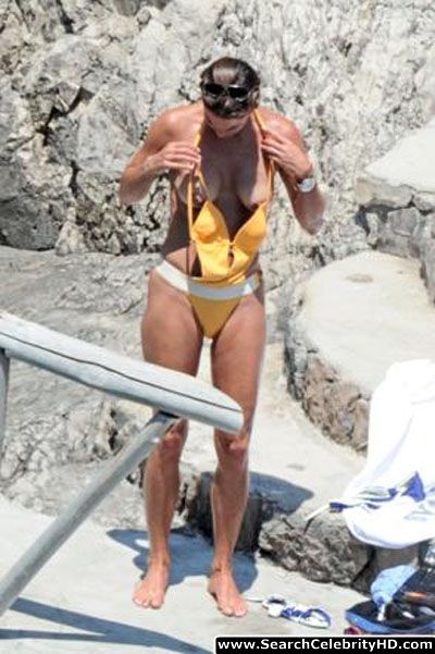 Fiona swarovski candid topless sunbathing bikini photos