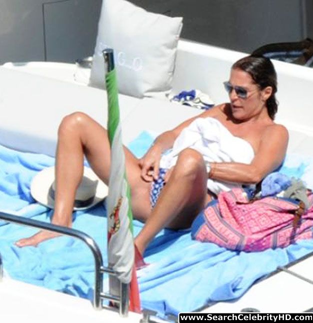 Fiona swarovski candid topless sunbathing bikini photos