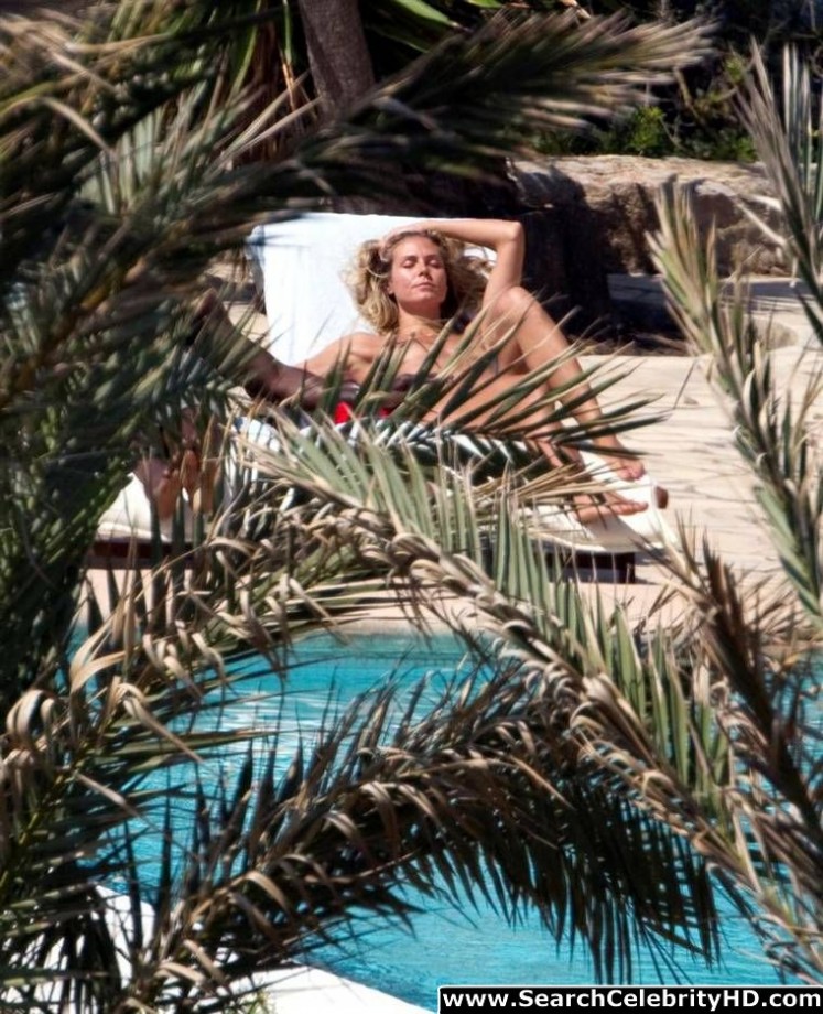 Heidi klum topless sunbathing candids in ibiza