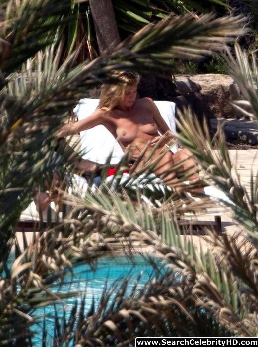 Heidi klum topless sunbathing candids in ibiza