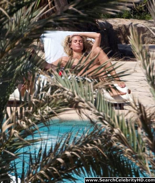 Heidi klum topless sunbathing candids in ibiza