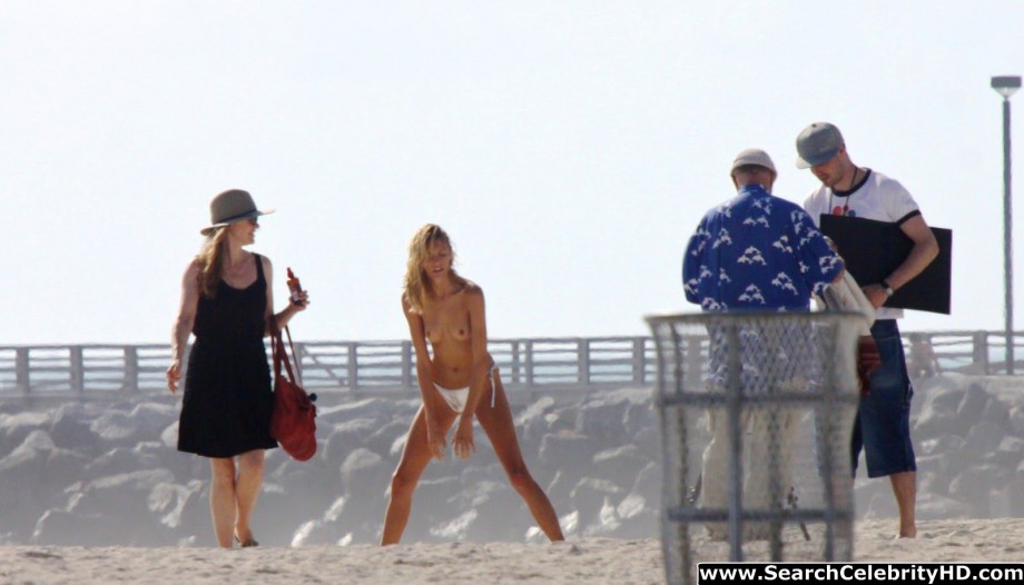 Anja rubik shows off her candid topless boobs at the beach