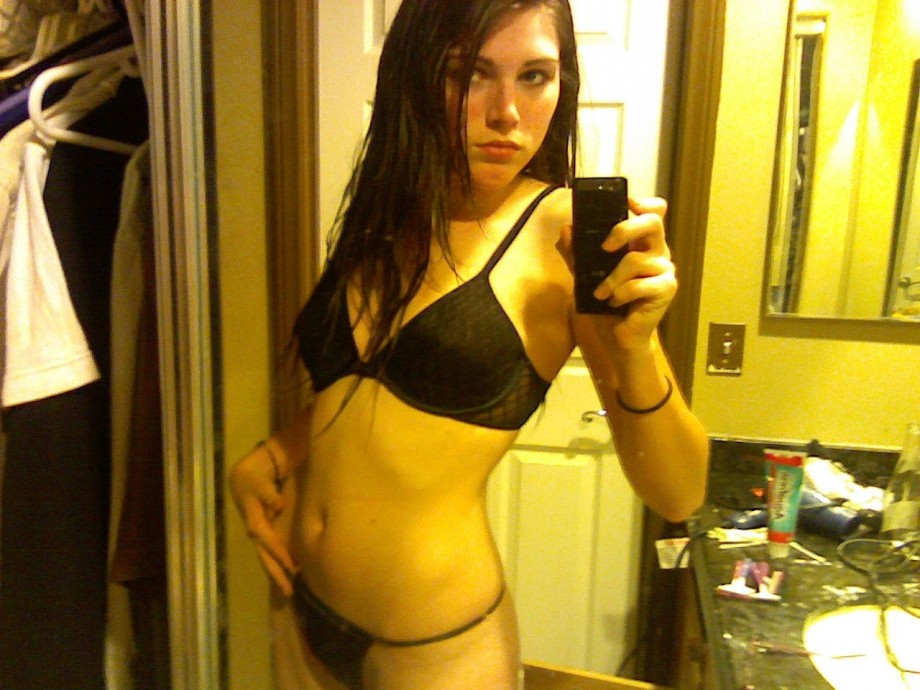 Brunette teen posing for her boyfriend