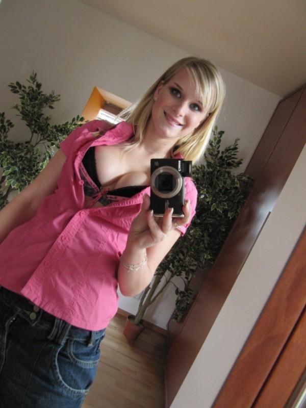 Blonde beauty selfshot in the mirror