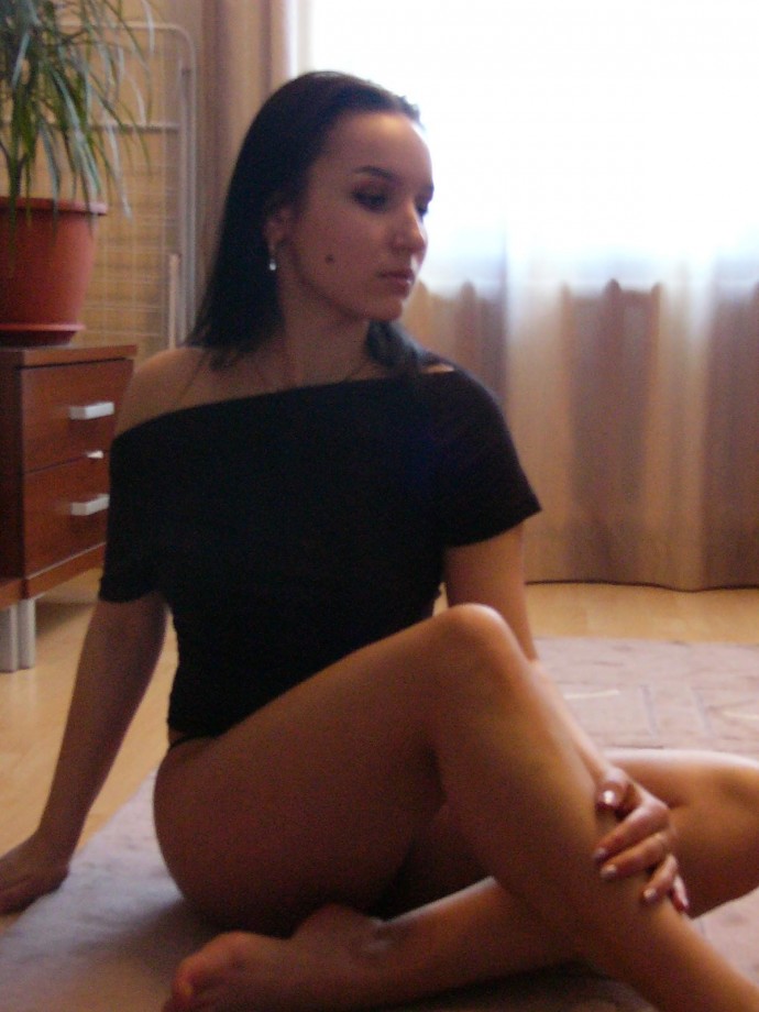 Sexy russian brunette likes to pose