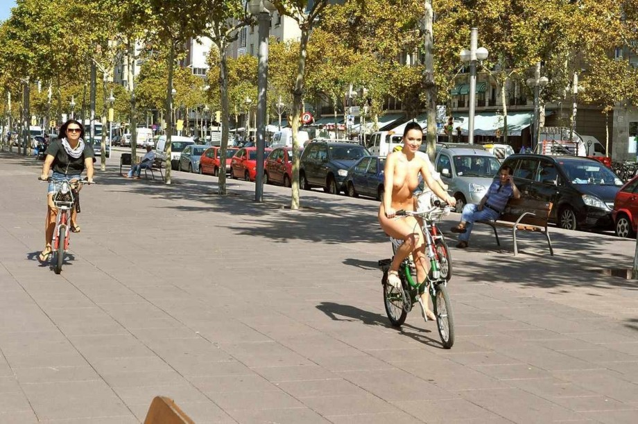 Nudist woman with bikes