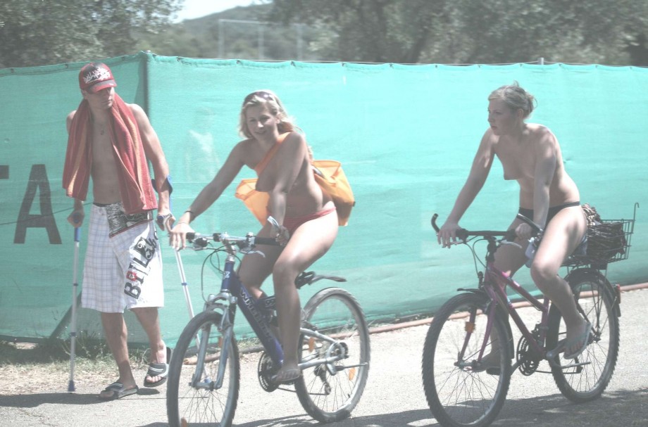 Nudist woman with bikes