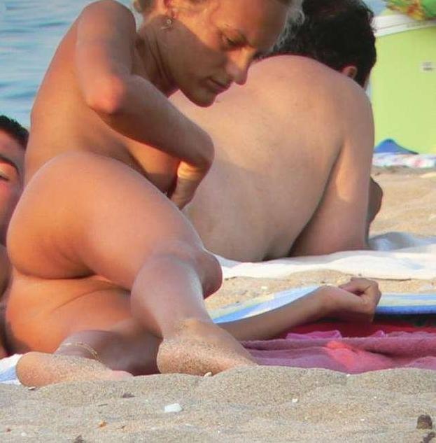 Tanned beach nudist
