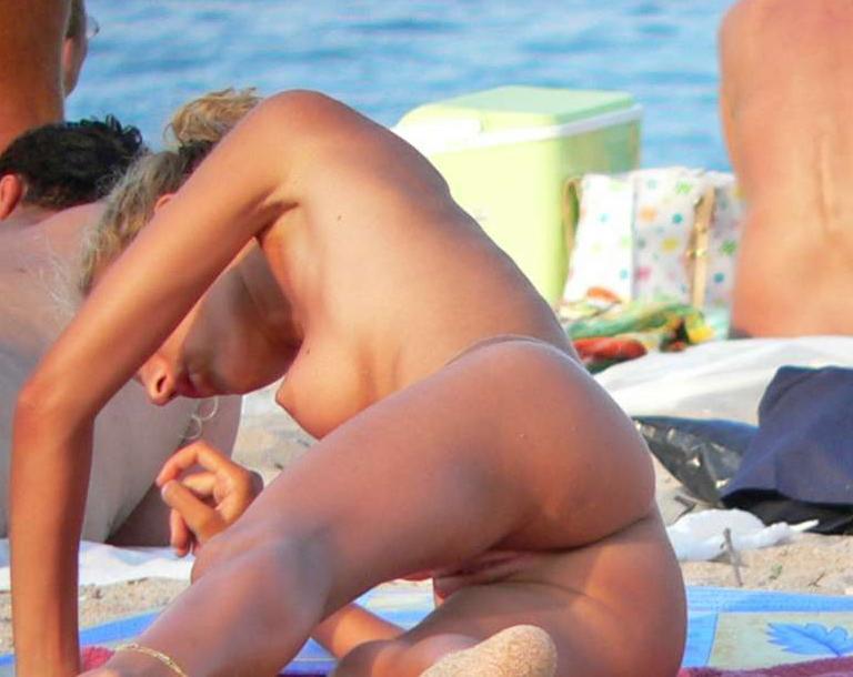 Tanned beach nudist