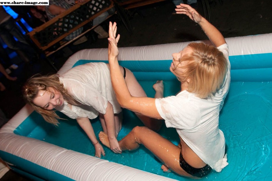 Party girls in club - fighting in pool - wet t-shirt