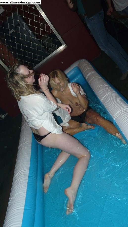 Party girls in club - fighting in pool - wet t-shirt