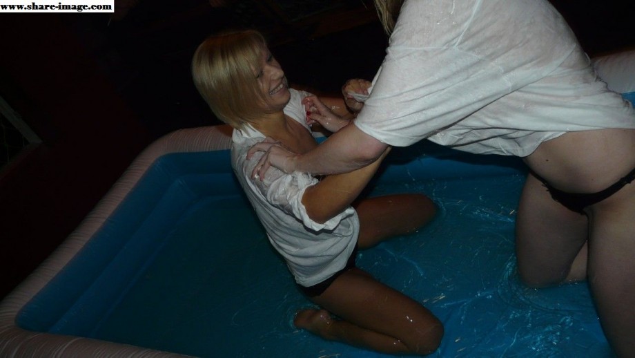 Party girls in club - fighting in pool - wet t-shirt