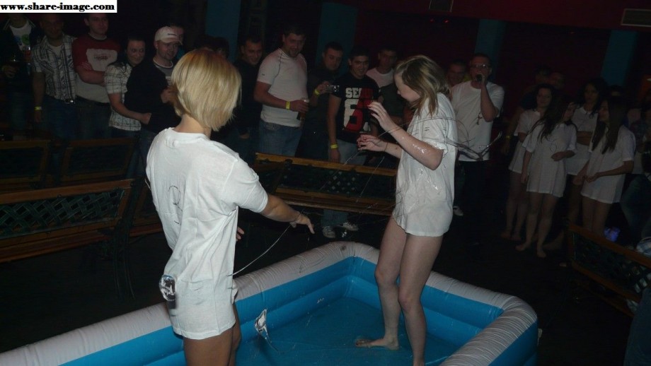 Party girls in club - fighting in pool - wet t-shirt