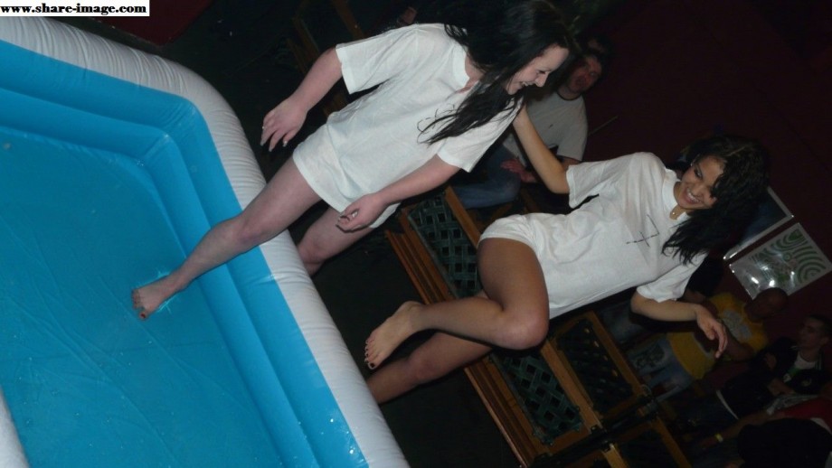 Party girls in club - fighting in pool - wet t-shirt