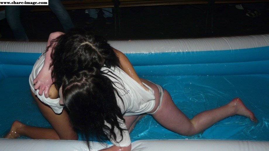 Party girls in club - fighting in pool - wet t-shirt