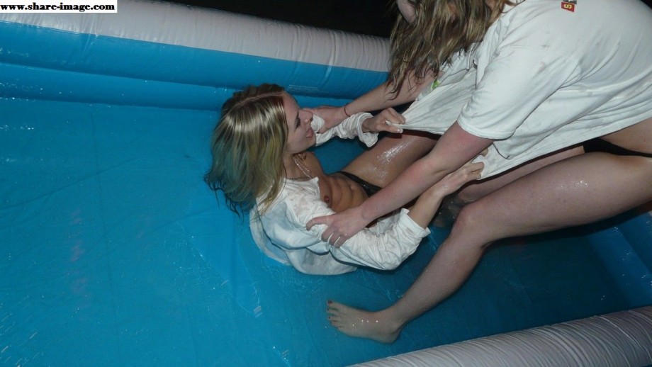 Party girls in club - fighting in pool - wet t-shirt