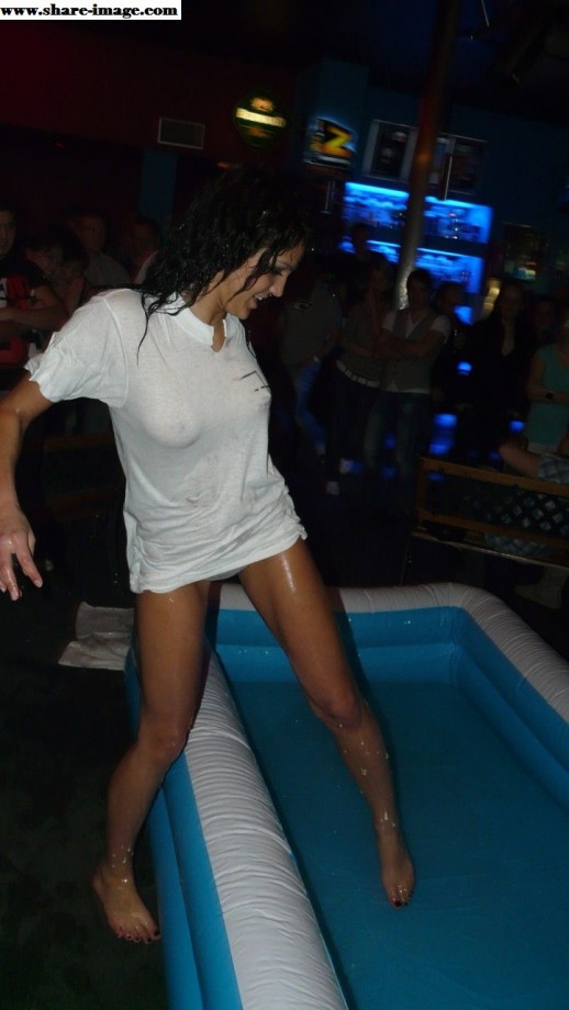 Party girls in club - fighting in pool - wet t-shirt