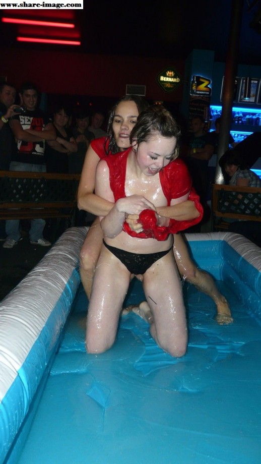 Party girls in club - fighting in pool - wet t-shirt