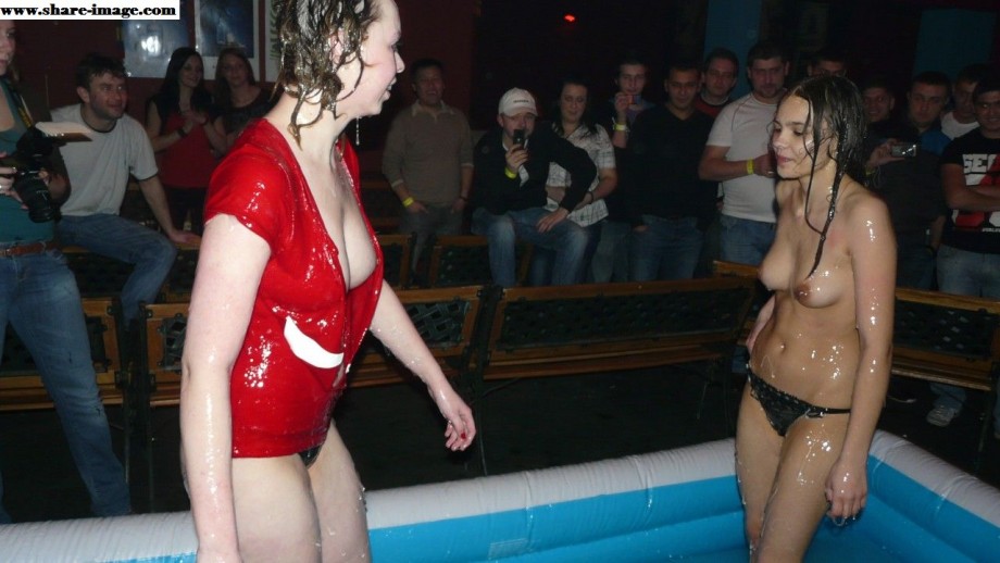 Party girls in club - fighting in pool - wet t-shirt