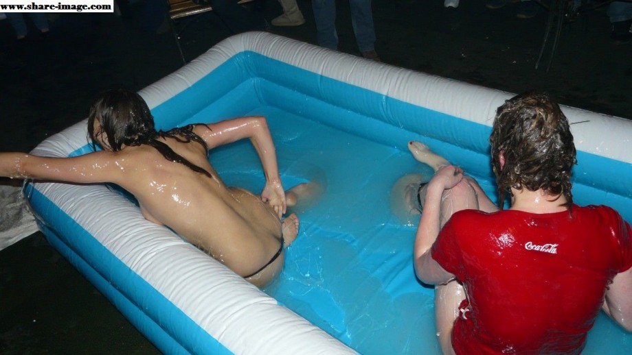 Party girls in club - fighting in pool - wet t-shirt