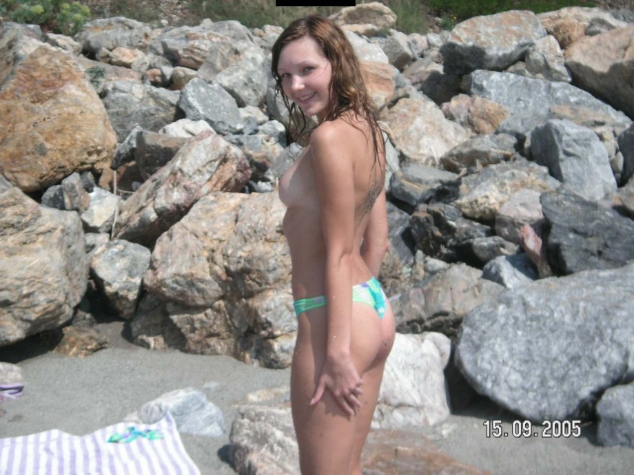 Brunette teen teasing on nude beach