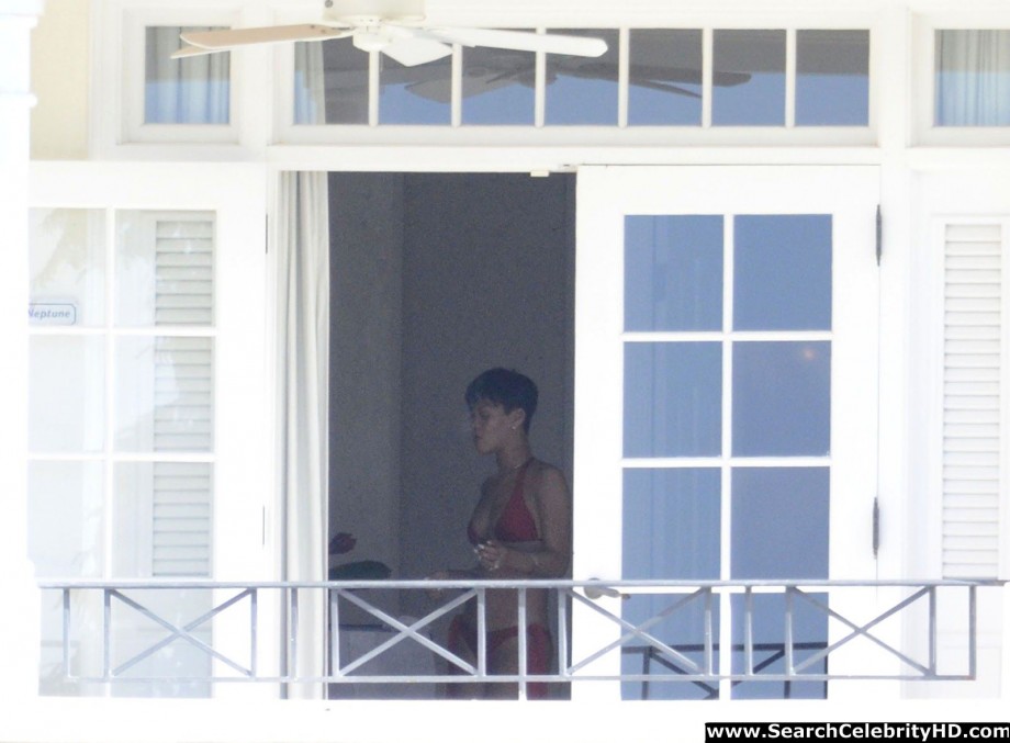 Rihanna naked ass and topless boobs candids through her balcony window - celebrity