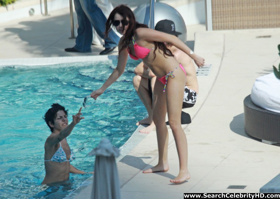 Miley cyrus - bikini candids at the fontainebleau hotel in miami - celebrity