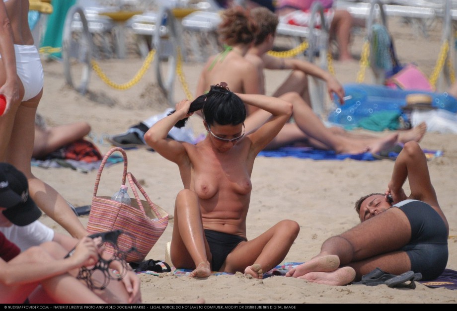 Topless girls on the beach - 112