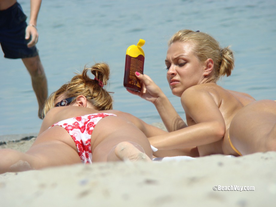Topless girls on the beach - 202