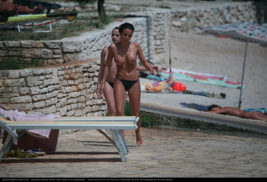 Topless girls on the beach - 103