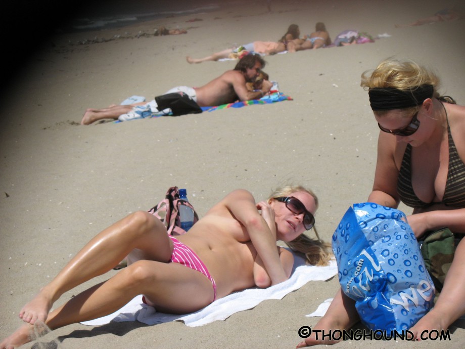 Topless girls on the beach - 284