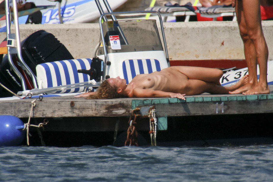 Nudist horny couple taking pictures