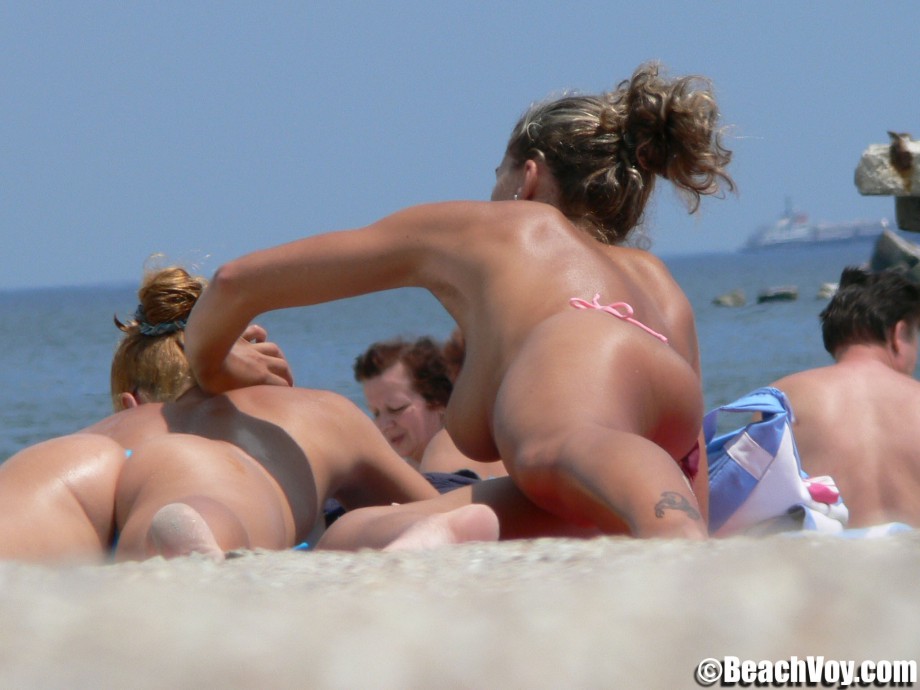 Topless girls on the beach - 102