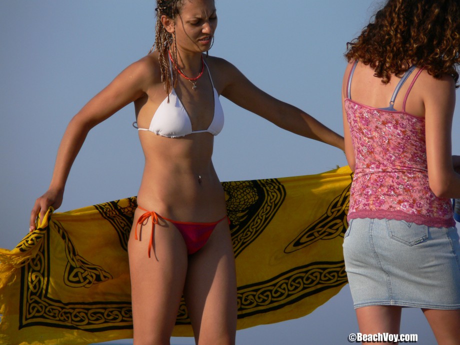 Topless girls on the beach - 250