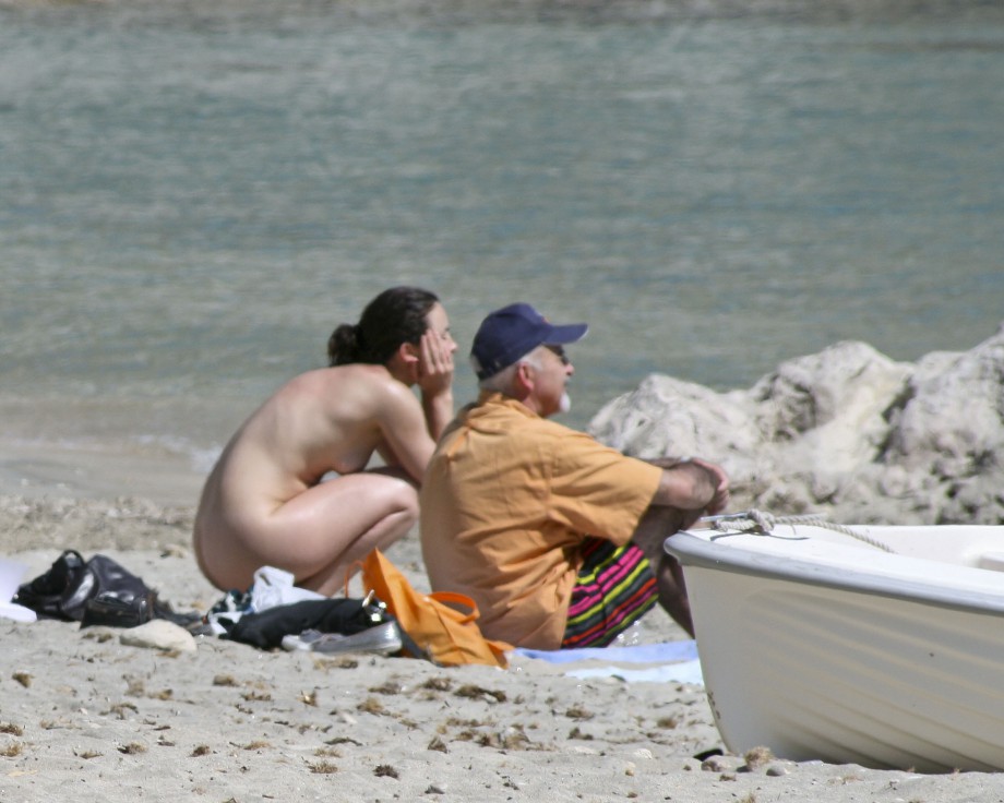Nudist daughter and father at the beach cmnf